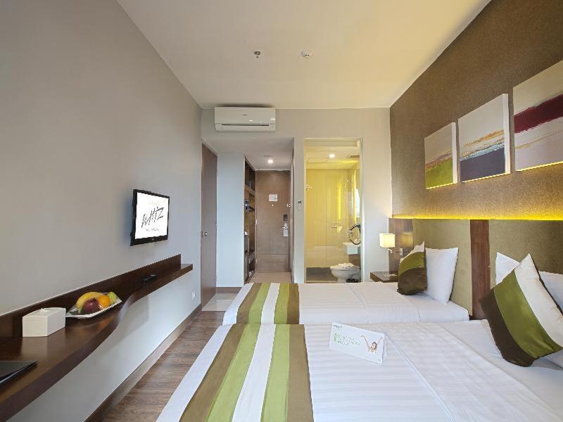 El Hotel Jakarta Værelse billede